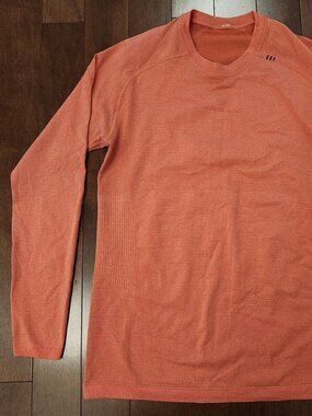 Lululemon men's long sleeve orange top in size small